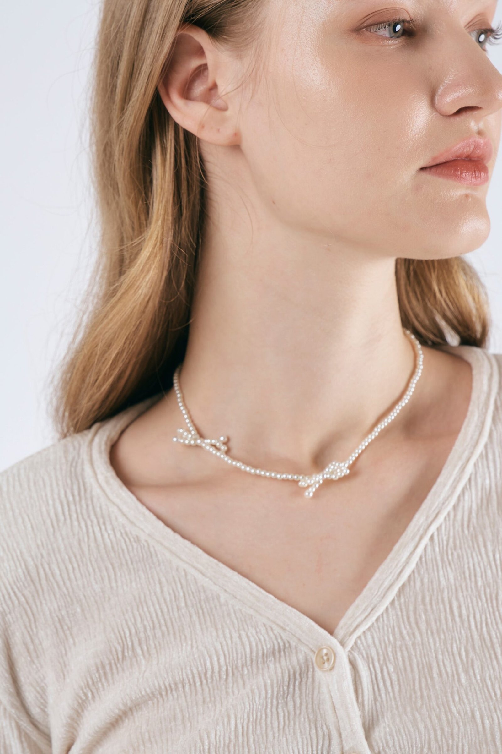 FauxPearlBowNecklaces_02_b3acf44e-e69f-4bdf-a059-8880b24c88c5-scaled-1.jpg